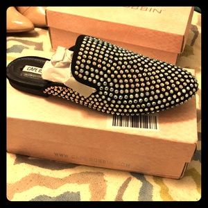 Black studded slip ons